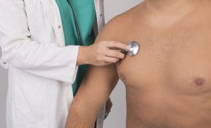 Man having breathing checked