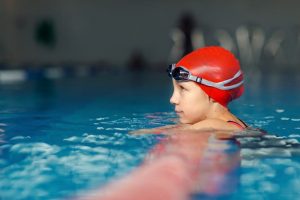 teen girl swimming 