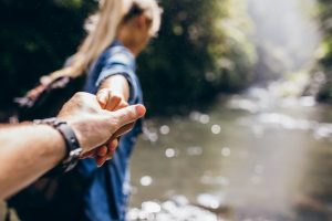 Woman pulling partner by the hand