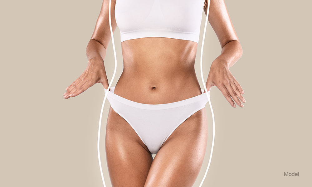 Woman with her hands in her underwear